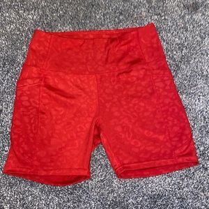 Nicole Miller red leopard workout biker shorts.